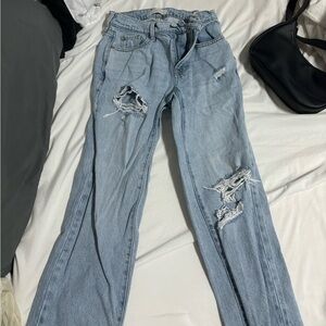 Light blue ripped jeans